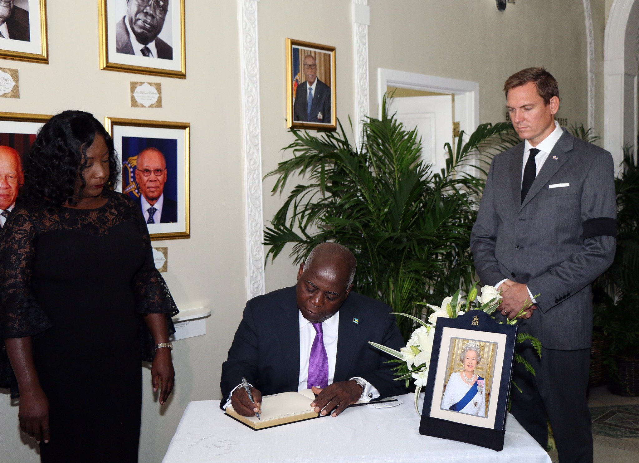 P M Philip Davis Signs The Book Of Condolence On The Passing Of HM 