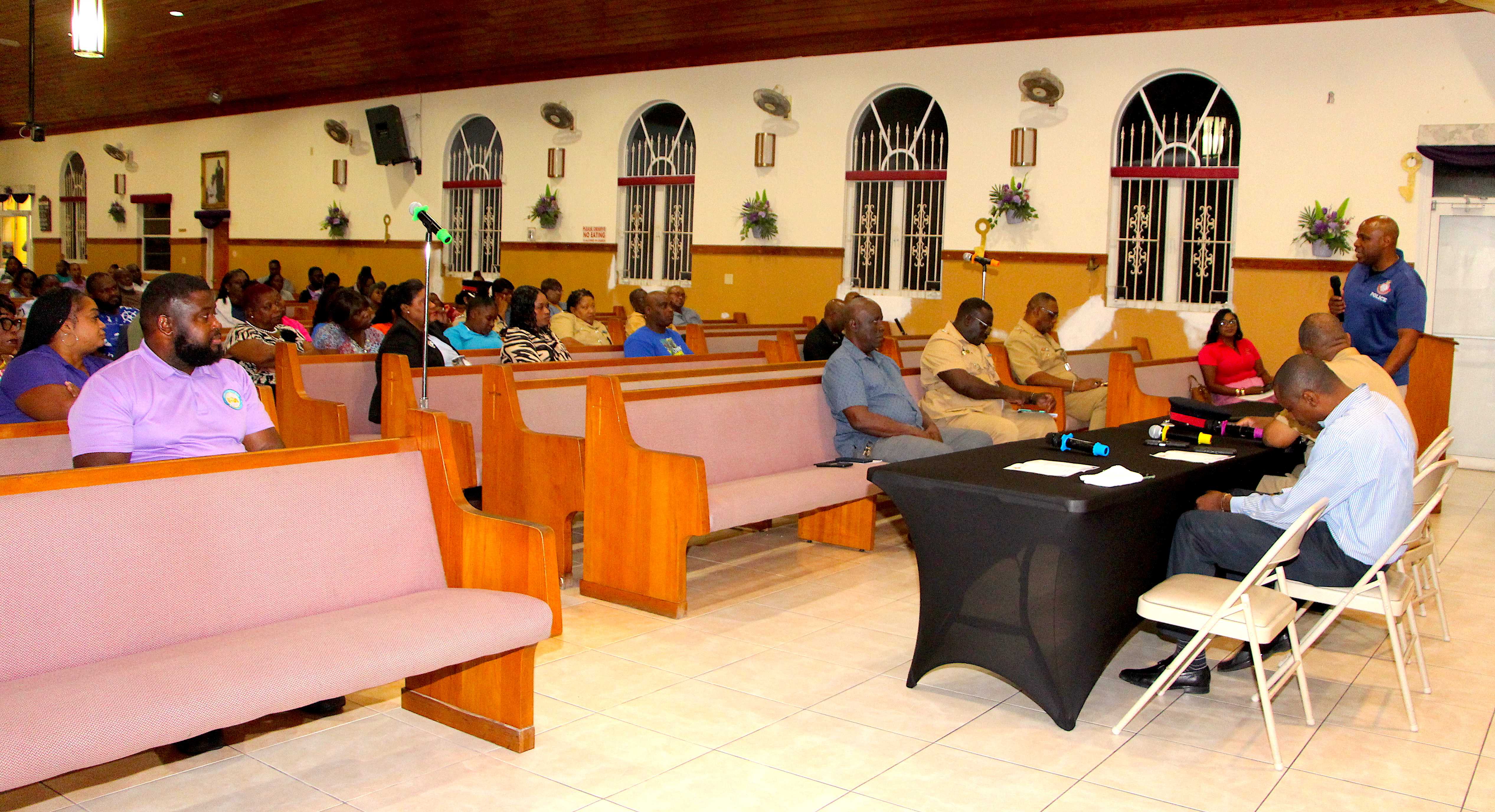 Carmichael Urban Renewal and the police force present security tips to Flamingo Gardens residents